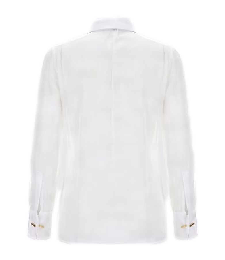 Camicia bianca e nera con frange frontali