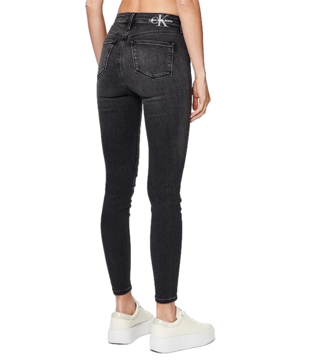 Skinny fit black denim jeans with black ck logo on the back
